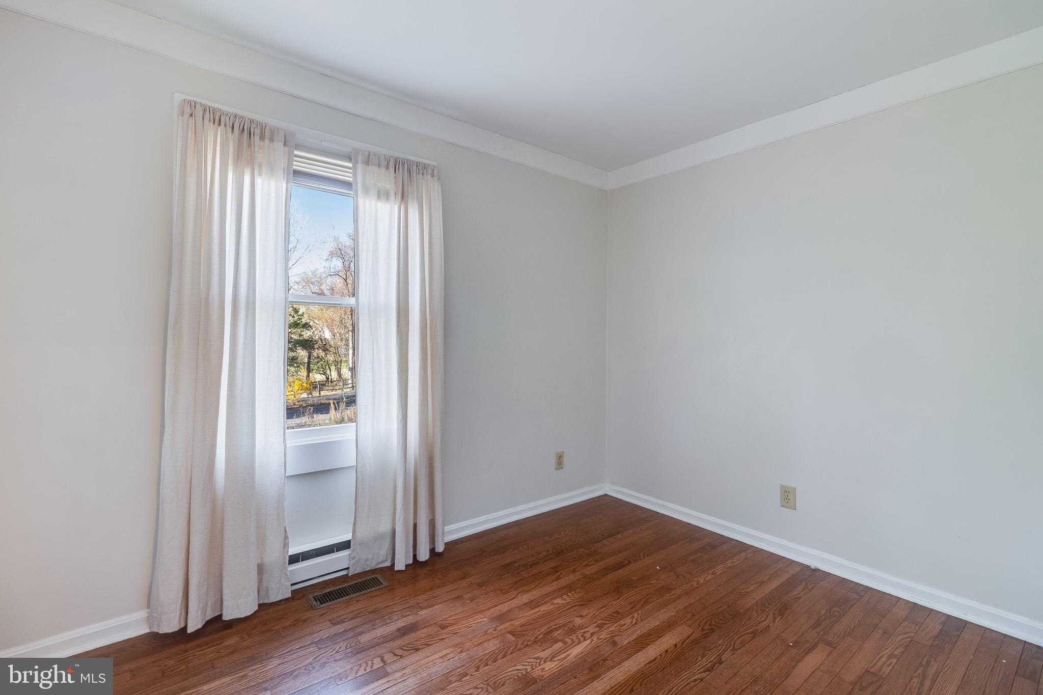 5131 Solomons Island Road Huntingtown, MD 20639 - Photo 23 of 42 wooden floor in an empty room