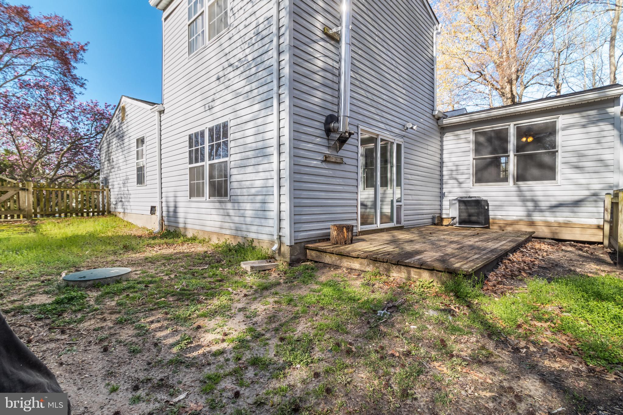 5131 Solomons Island Road Huntingtown, MD 20639 - Photo 41 of 42 a view of a house with backyard and a tree