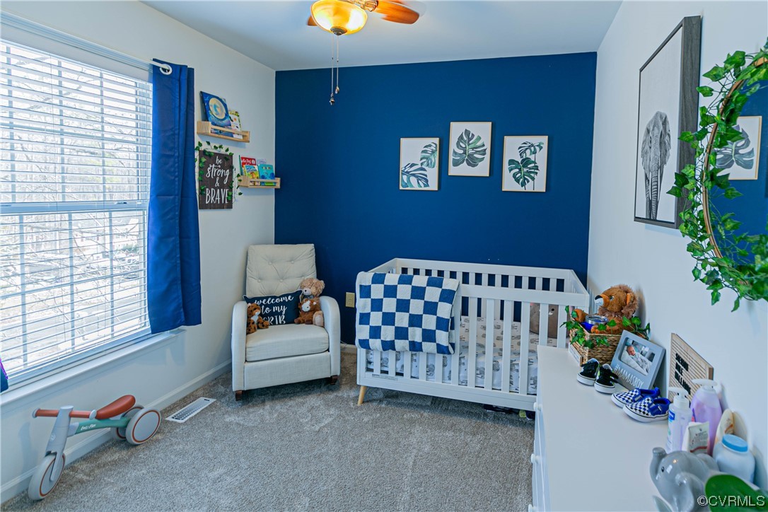 213 Cedar Ridge Drive Ruther Glen, VA 22546 - Photo 17 of 50 Bedroom featuring light colored carpet, a nursery