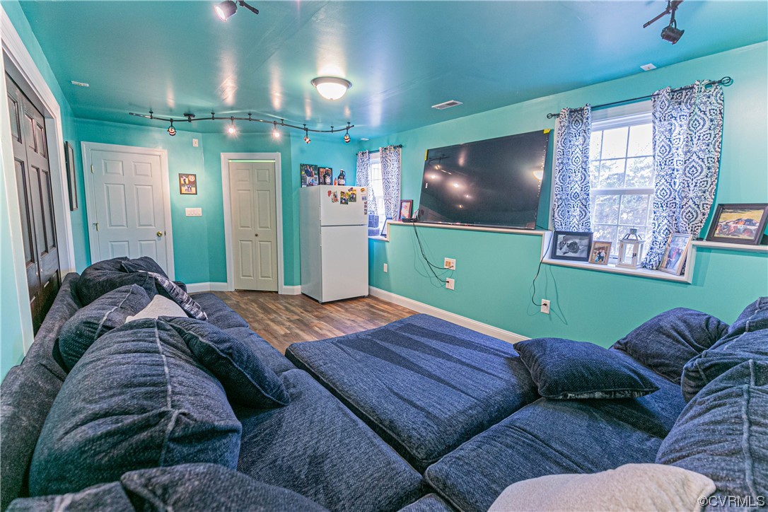 213 Cedar Ridge Drive Ruther Glen, VA 22546 - Photo 28 of 50 Living room featuring dark hardwood / wood-style f