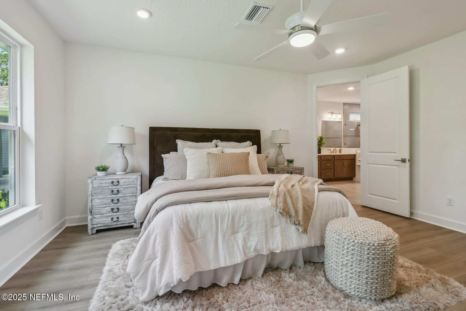 211 Rushing Drive St. Augustine, FL 32092 - Photo 14 of 25 a bedroom with bed and window