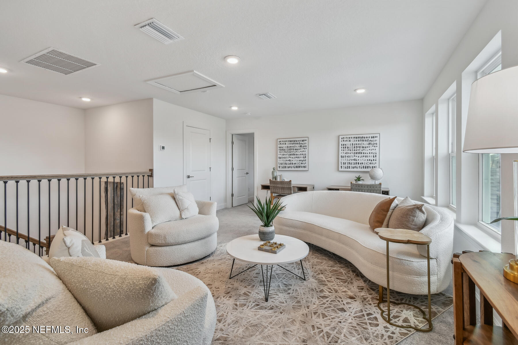 211 Rushing Drive St. Augustine, FL 32092 - Photo 21 of 25 a living room with furniture and a couch