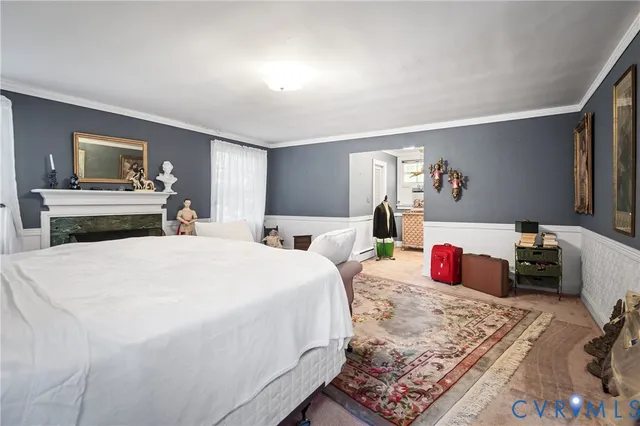 a bed room with a bed and a television