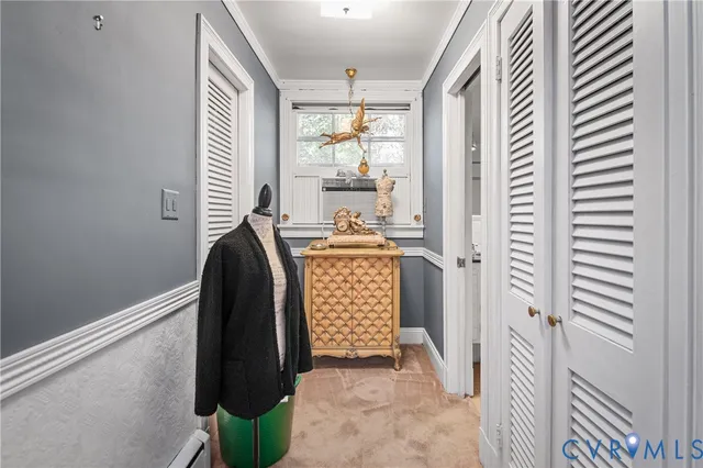 a view of entryway with workspace and window