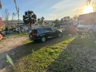 a view of a car in a street
