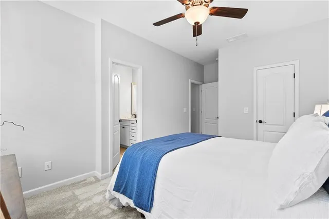 a bathroom with a granite countertop sink mirror and double