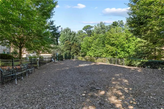 a view of a chairs and table in a patio