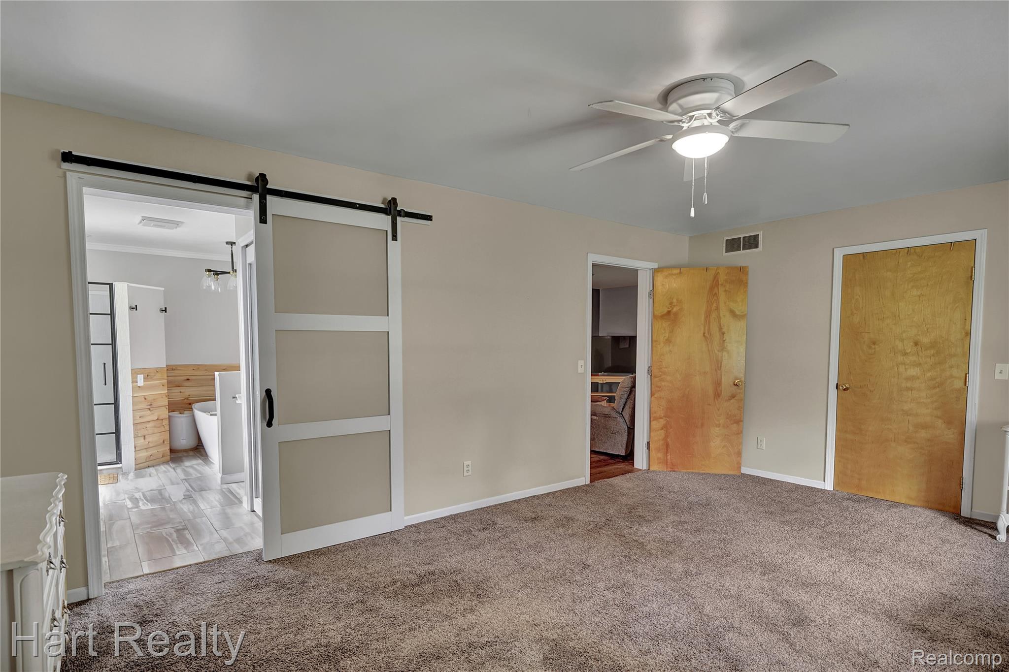 7167 Brown School Road North Branch, MI 48461 - Photo 24 of 51 Spacious room featuring neutral carpeting and a ceiling fan