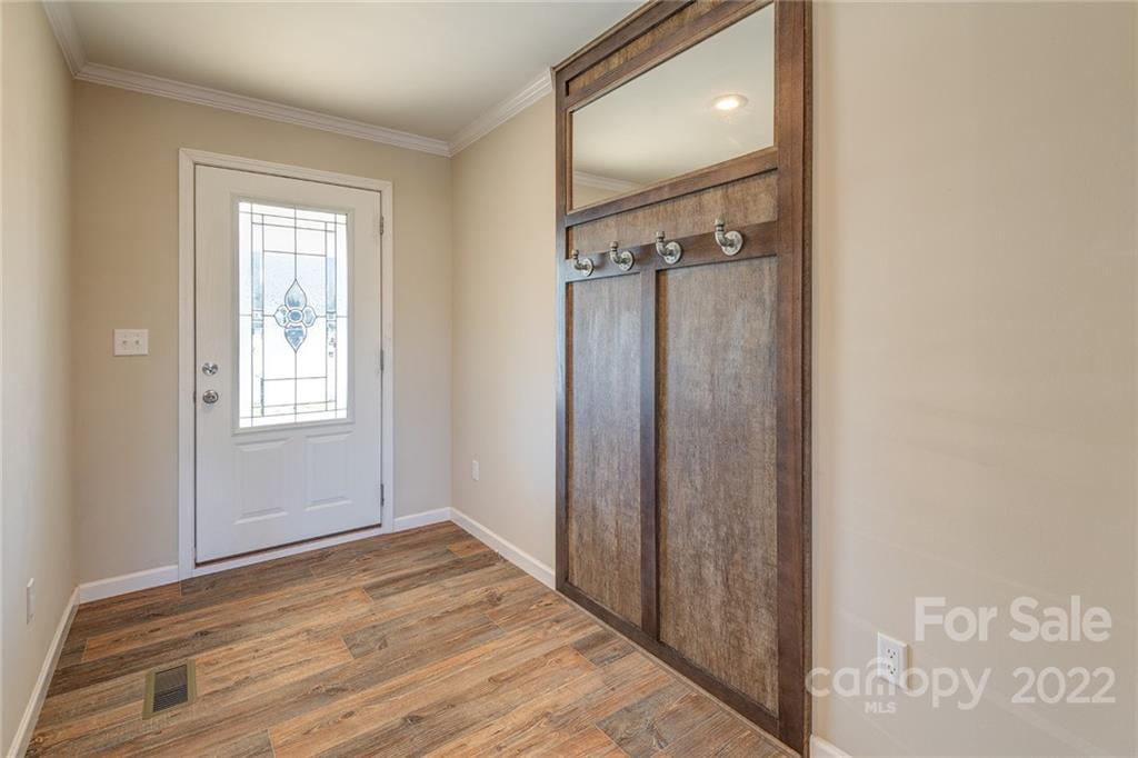 26 Jake Road Clyde, NC 28721 - Photo 3 of 24 a bathroom with a sink and a mirror