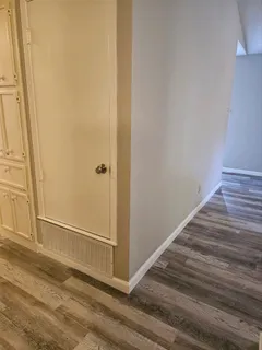 a kitchen with a sink and a stove top oven