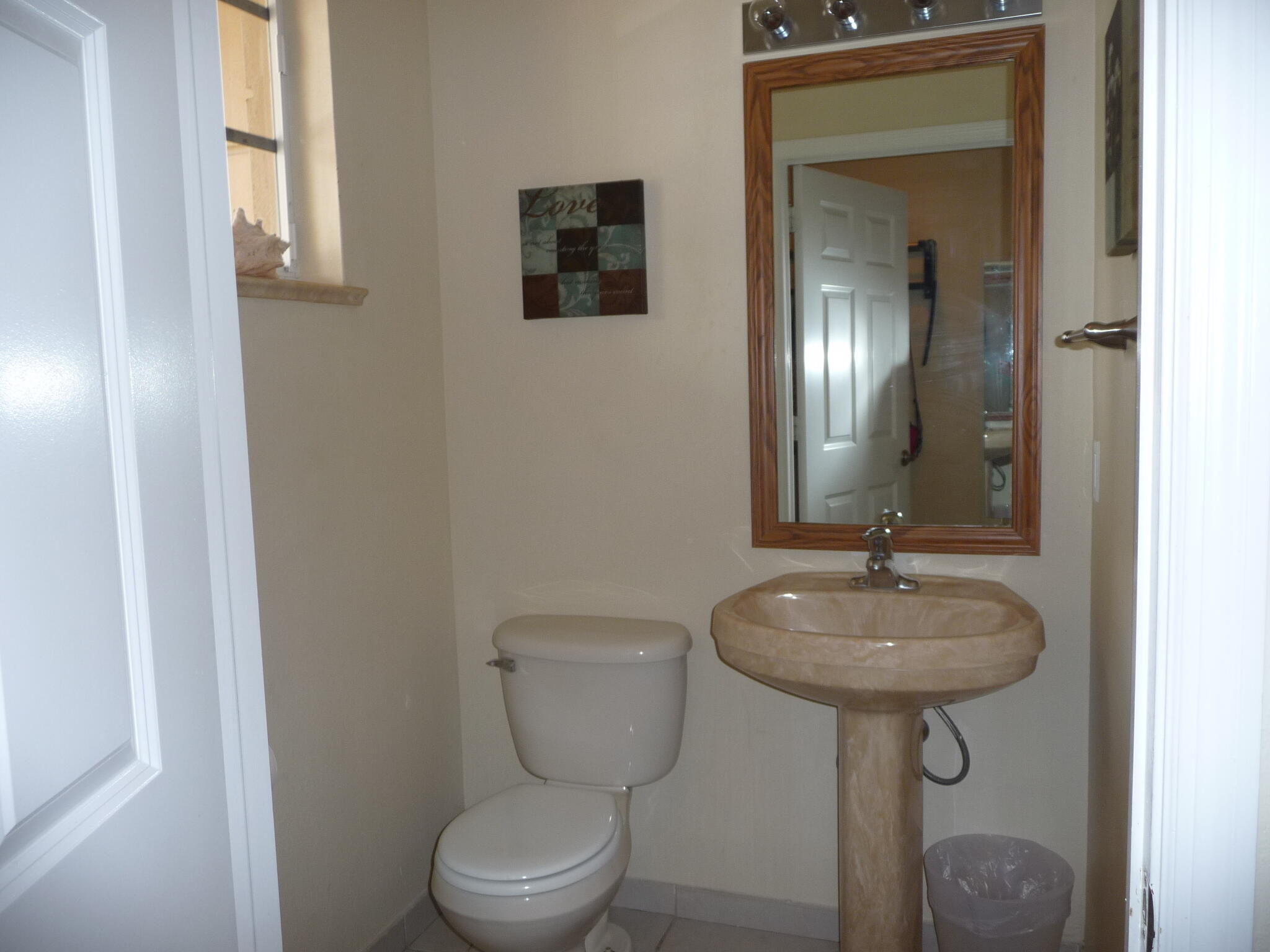 1962 Marsh Harbor Drive Riviera Beach, FL 33404 - Photo 6 of 15 HALF BATH