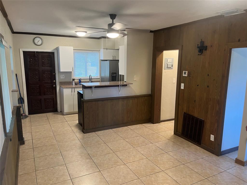 101 Fronton Boulevard Dania Beach, FL 33004 - Photo 16 of 17 a kitchen with stainless steel appliances granite countertop a refrigerator and a sink