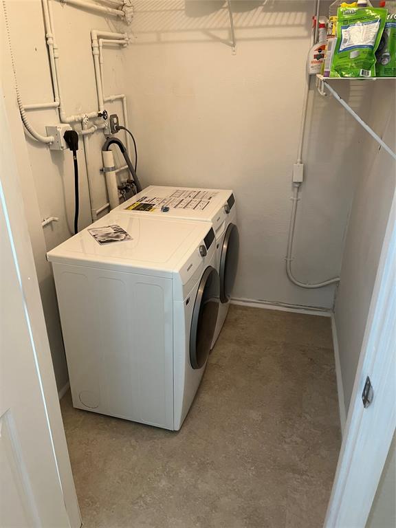 101 Fronton Boulevard Dania Beach, FL 33004 - Photo 7 of 17 a utility room with dryer and washer