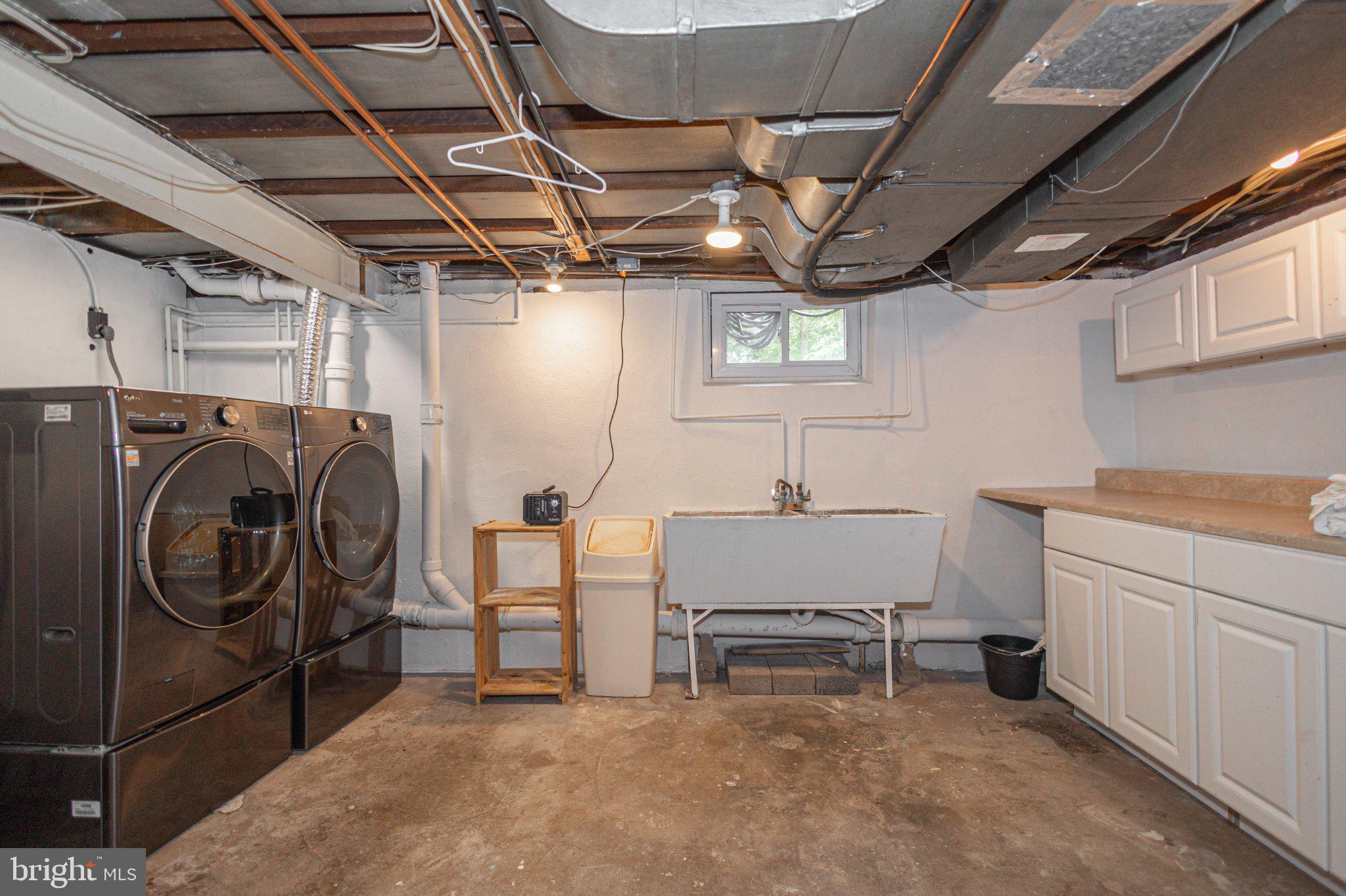 10 Effingham Road Yardley, PA 19067 - Photo 50 of 68 Clean and Bright Laundry Room in Basment