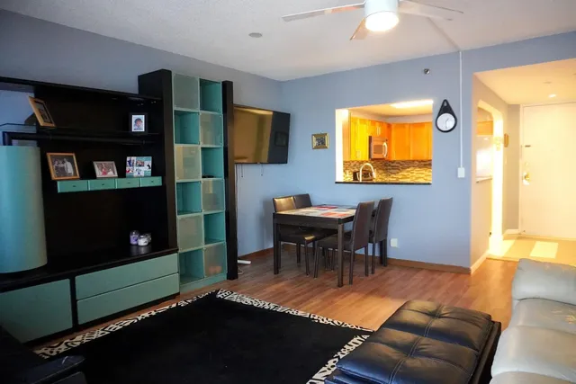 a view of a livingroom with furniture and window