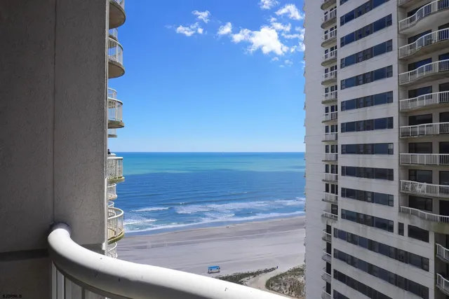 a view of balcony with wooden floor