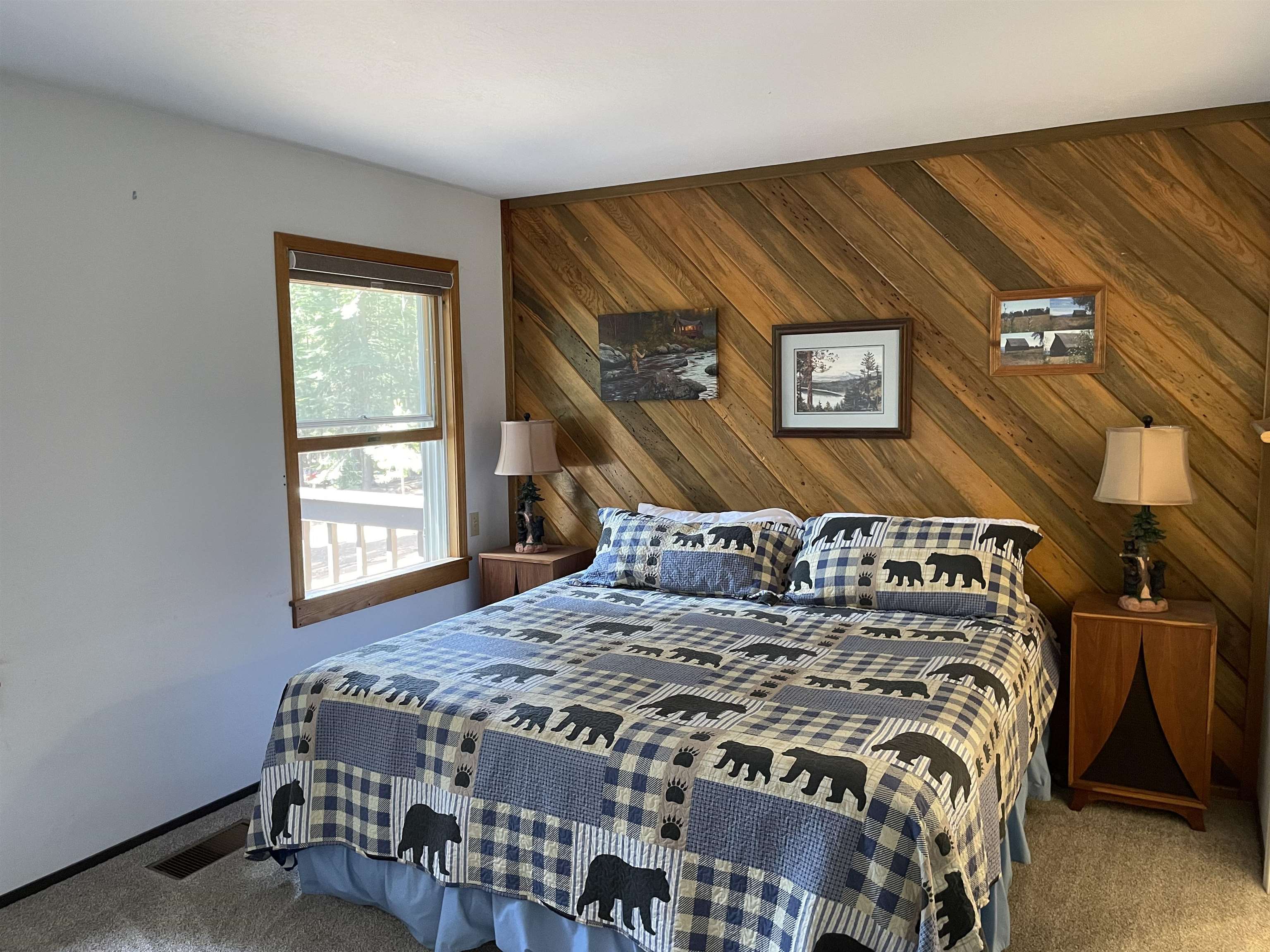 603 East Burnt Cedar Road Lake Almanor, CA 96137 - Photo 18 of 33 a bed sitting in a bedroom next to a window