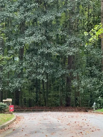 an outdoor space with wooden fence