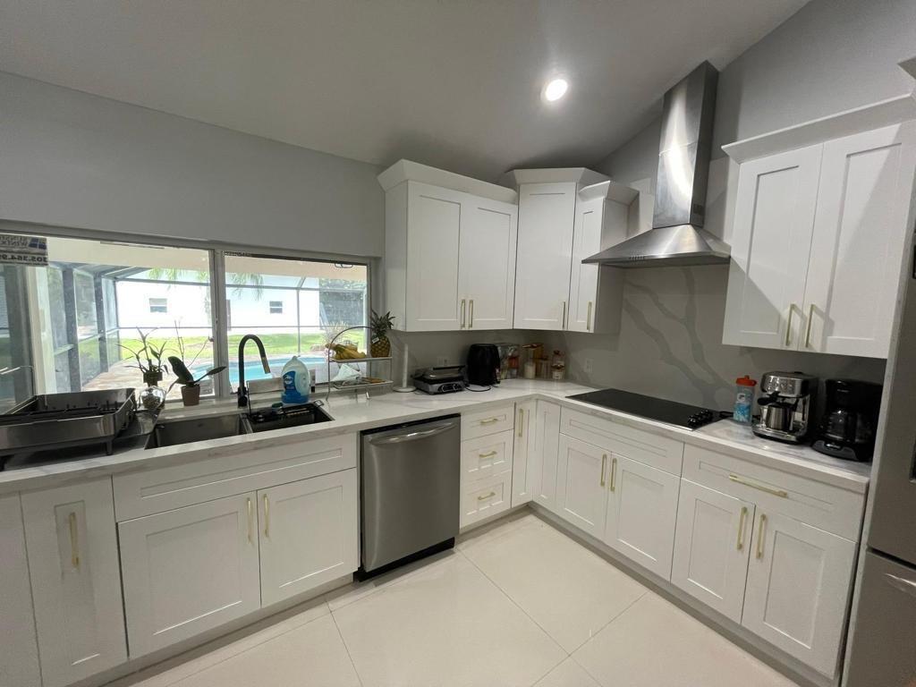 6530 Southwest 172nd Avenue Southwest Ranches, FL 33331 - Photo 22 of 42 a kitchen with sink and cabinets