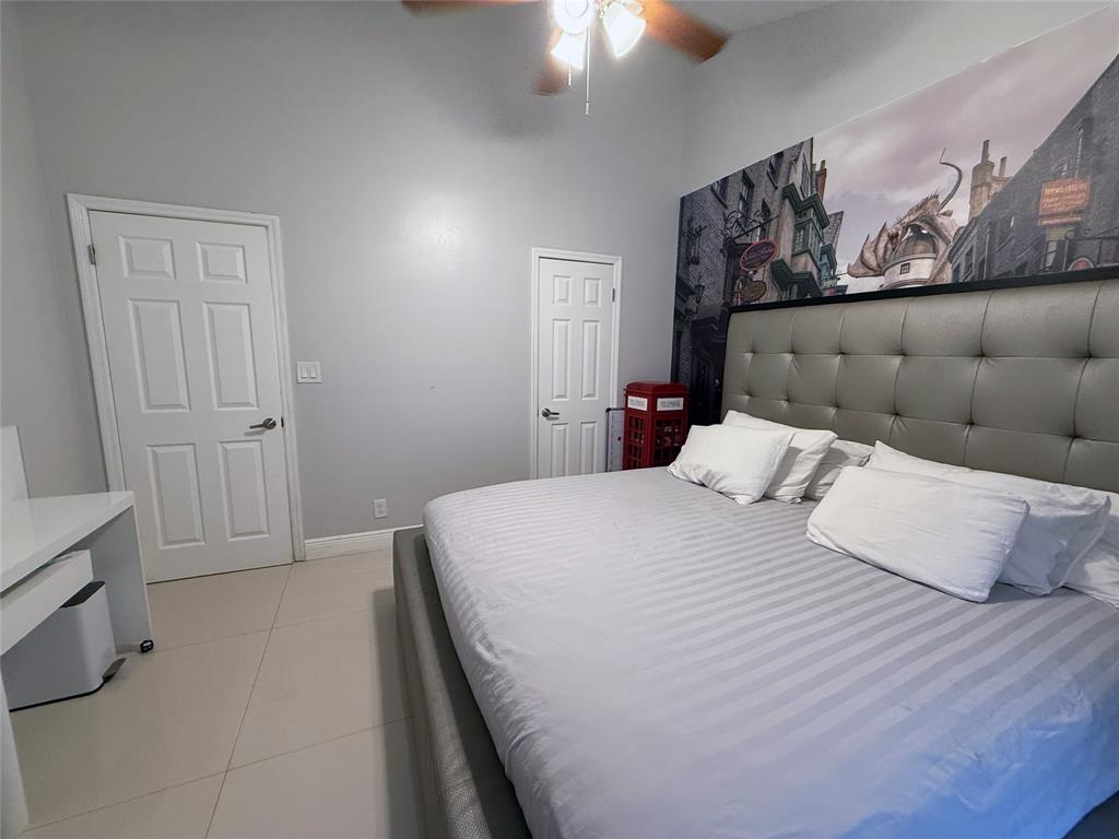 6530 Southwest 172nd Avenue Southwest Ranches, FL 33331 - Photo 25 of 42 a bedroom with a bed and a couch