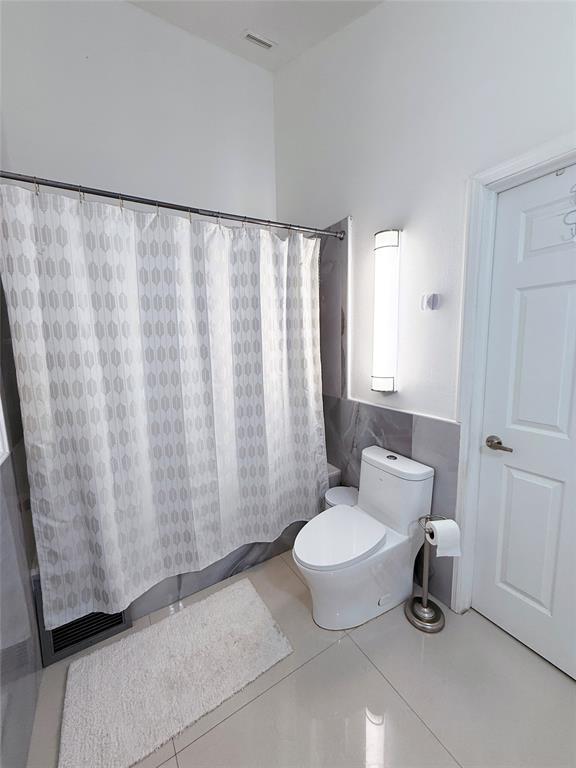 6530 Southwest 172nd Avenue Southwest Ranches, FL 33331 - Photo 28 of 42 a bathroom with a toilet and a sink