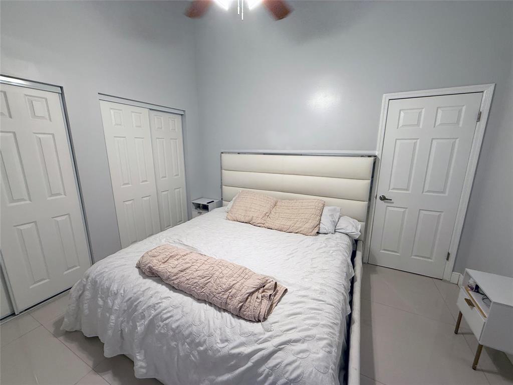 6530 Southwest 172nd Avenue Southwest Ranches, FL 33331 - Photo 29 of 42 a bedroom with a bed and cabinets