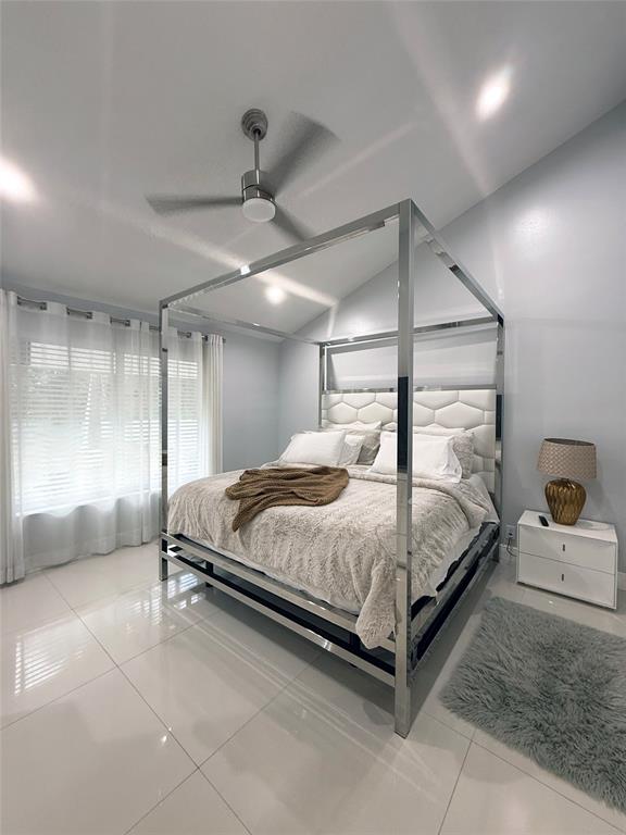 6530 Southwest 172nd Avenue Southwest Ranches, FL 33331 - Photo 37 of 42 a bedroom with a bed and large mirror