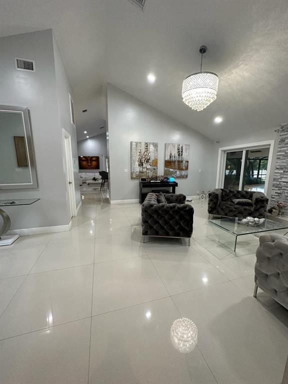 6530 Southwest 172nd Avenue Southwest Ranches, FL 33331 - Photo 10 of 42 a view of kitchen with furniture and a flat screen tv