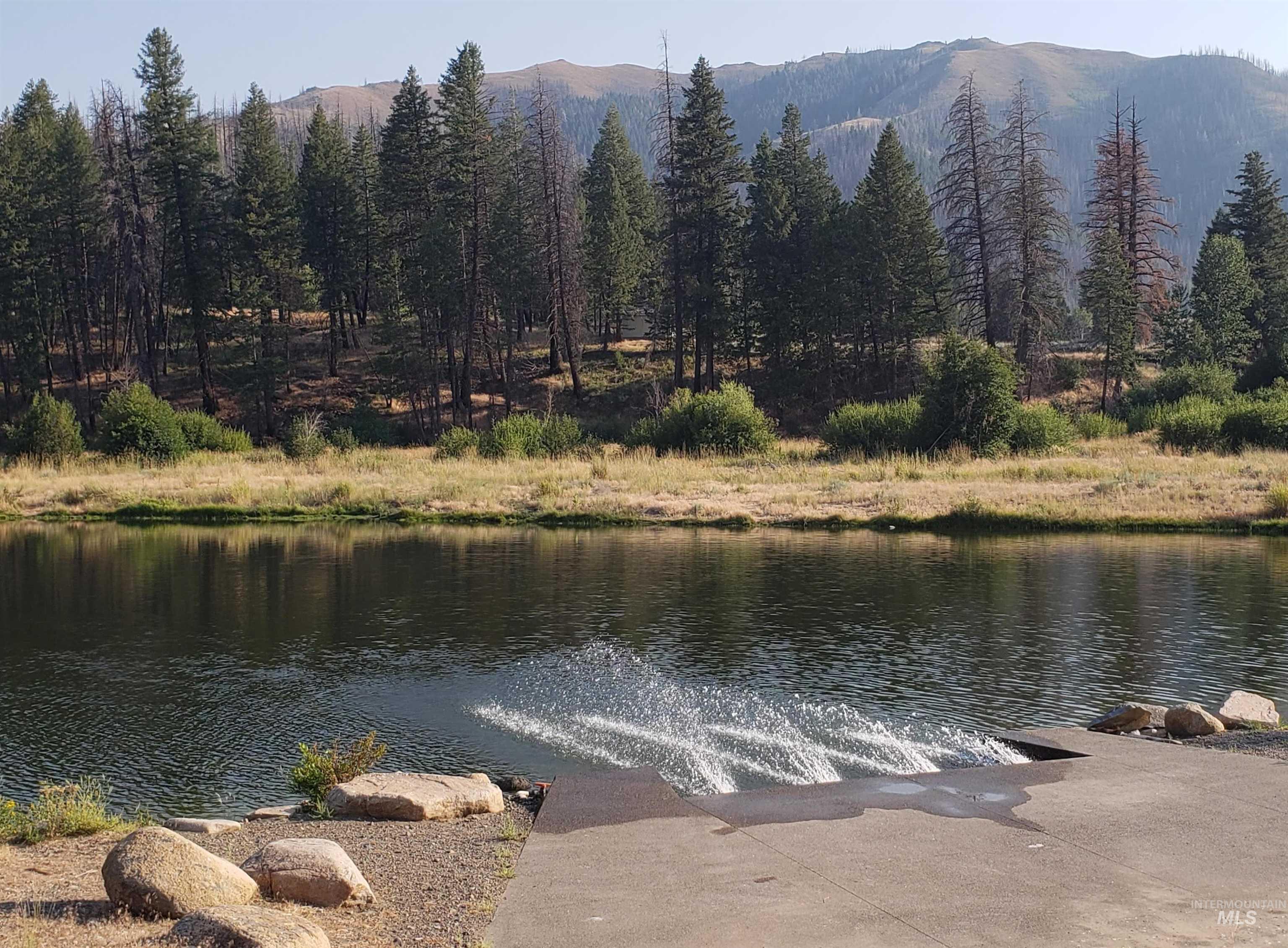 421 Deer Creek Road Hailey, ID 83333 - Photo 28 of 42 Water view with a mountain backdrop