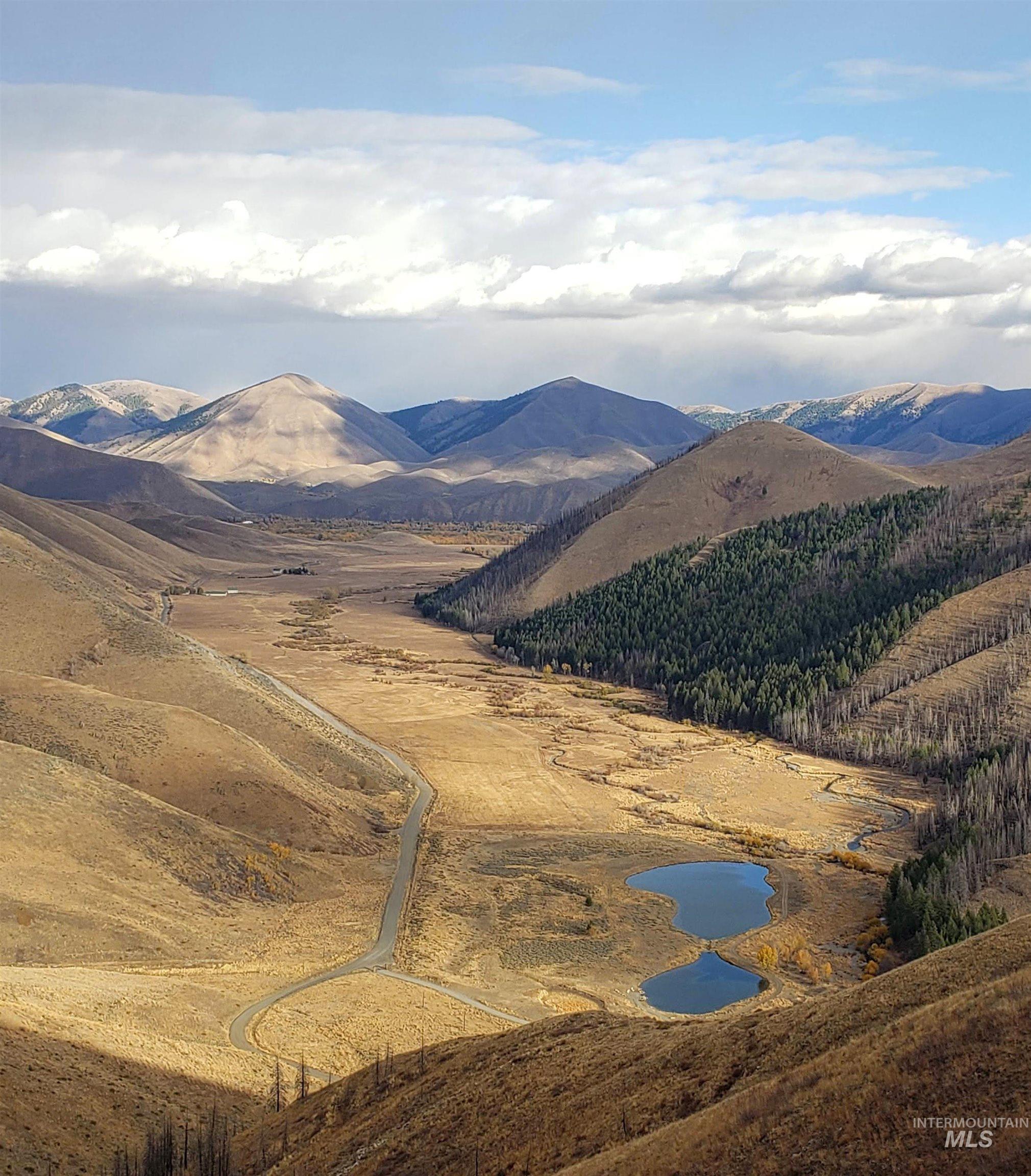 421 Deer Creek Road Hailey, ID 83333 - Photo 29 of 45 Mountain view with a nearby body of water
