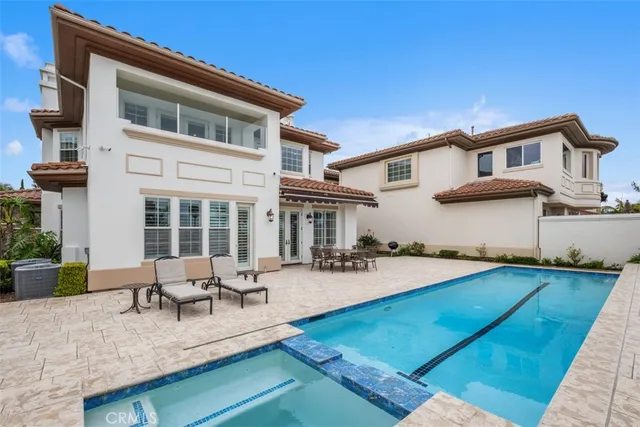 a house view with outdoor seating space