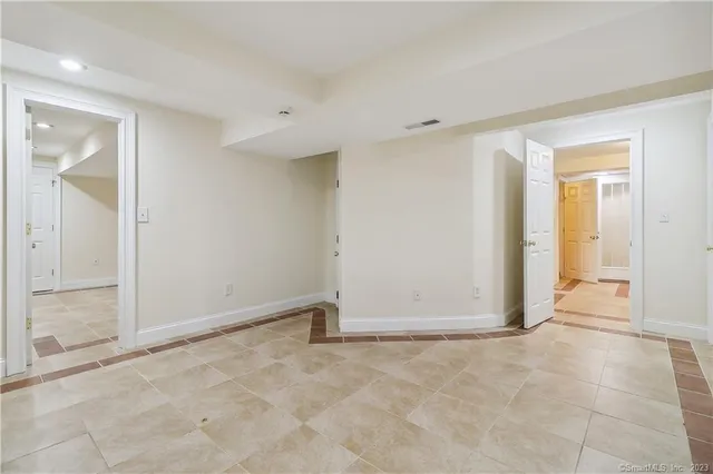 an empty room with a bathroom