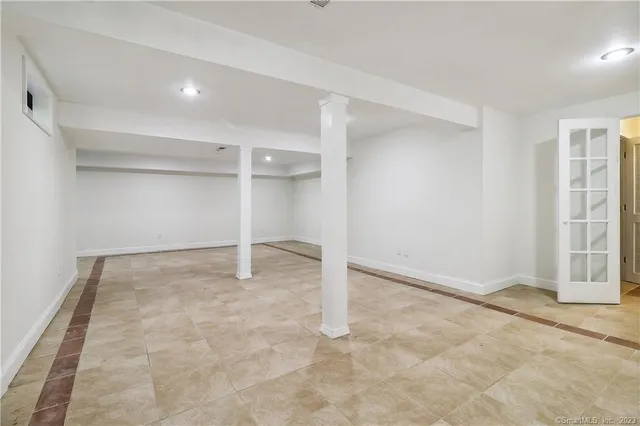 an empty room with windows