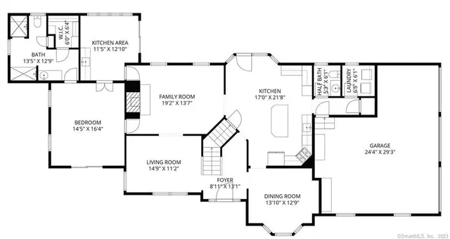 a view of a big yard with plants and large trees