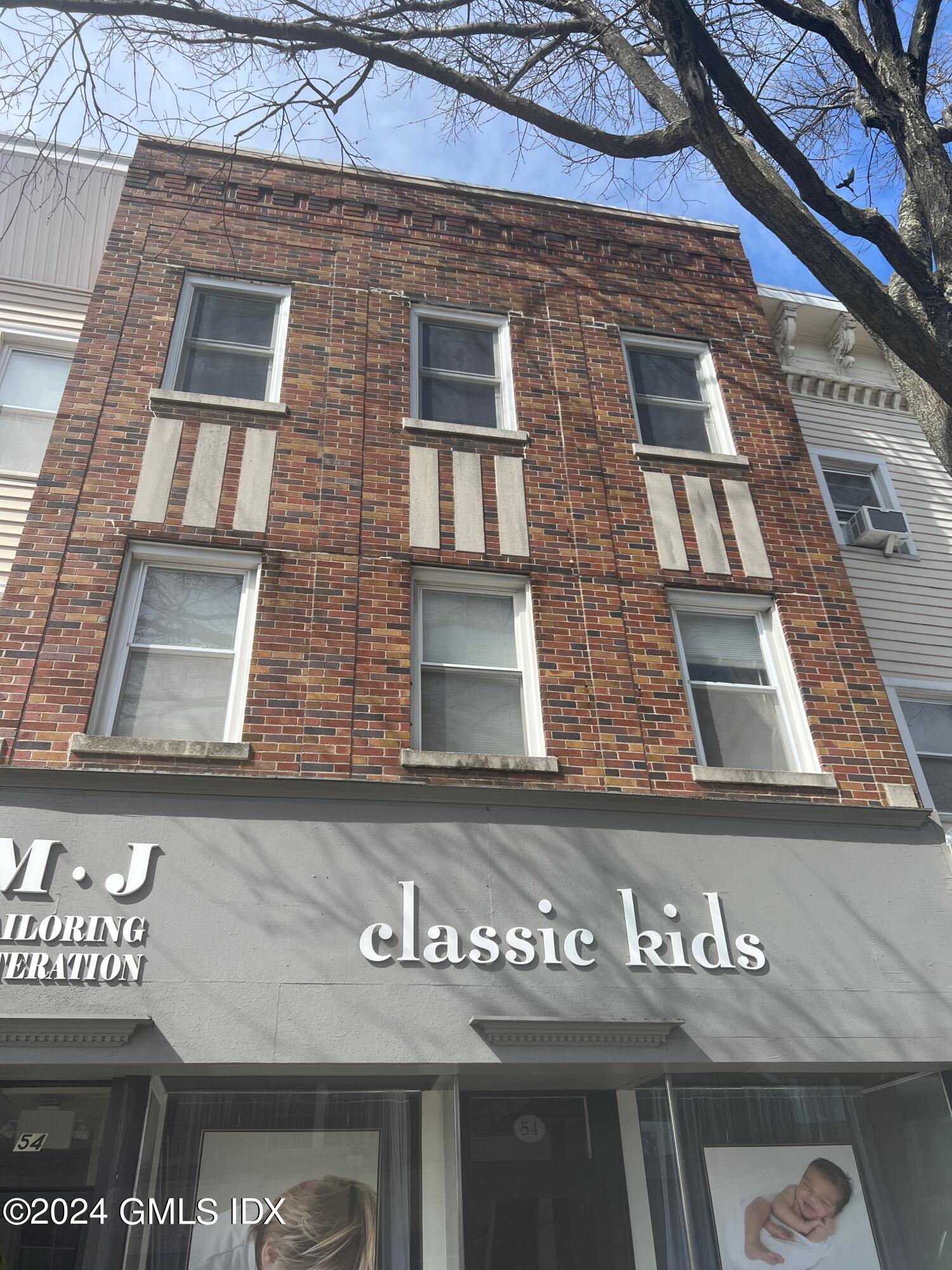 54 Greenwich Avenue, Unit 3 Greenwich, CT 06830 - Photo 2 of 30 a building with glass windows