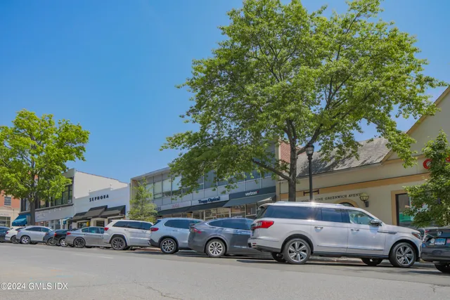 a car parked in front of a building