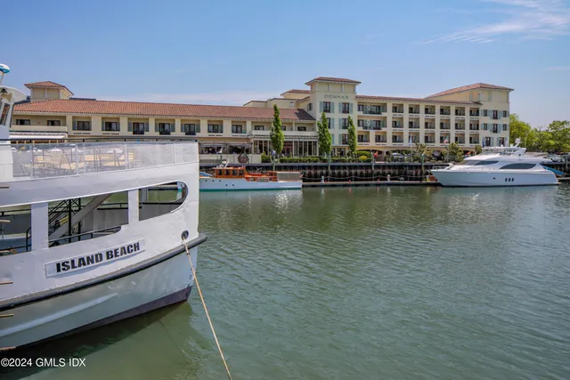 a view of a water with building in front of it