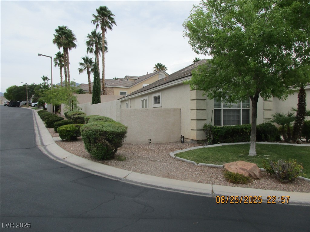 View of property exterior featuring stucco siding
