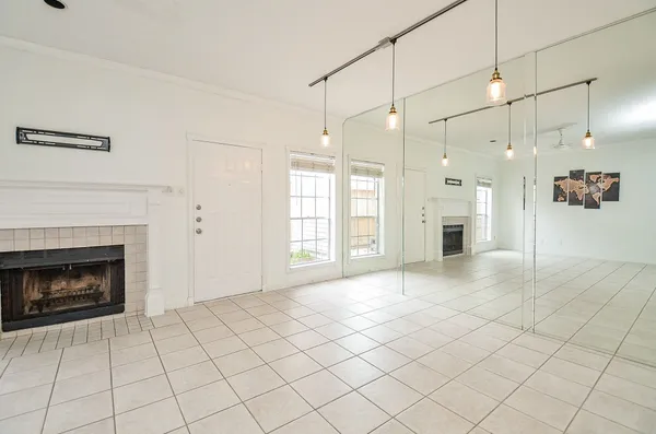 a kitchen with granite countertop wood cabinets and stainless steel appliances