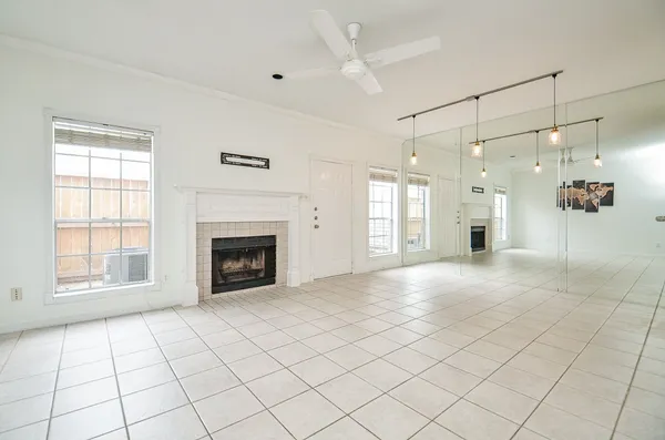 a kitchen with stainless steel appliances granite countertop a sink a stove and microwave