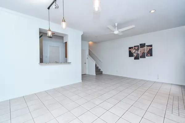 a kitchen with a sink stove and microwave