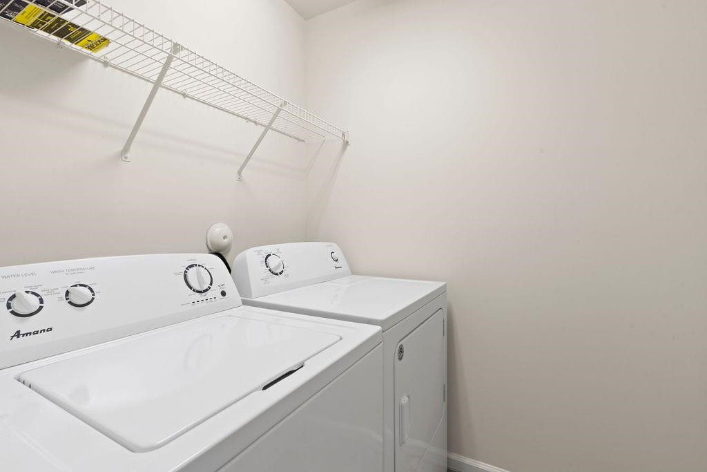 7033 Racine Way Raleigh, NC 27615 - Photo 22 of 30 Second Floor Laundry Room with Shelving