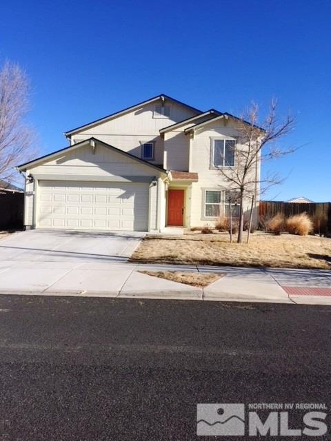 9132 Gilvarry Street Reno, NV 89506 - Photo 1 of 1 a front view of a house with a yard