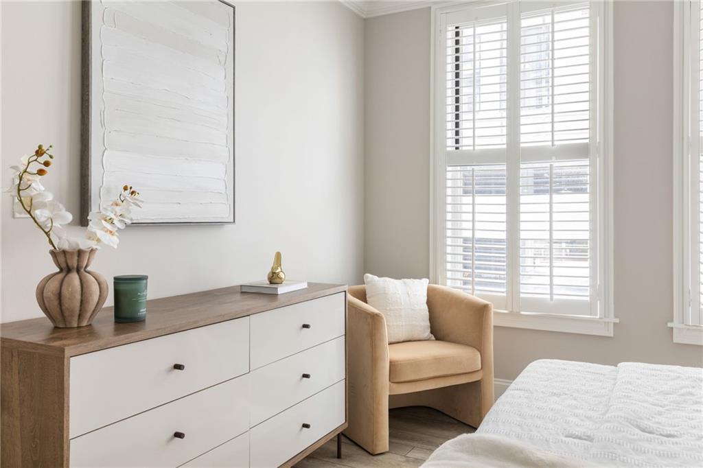 2255 Peachtree Road Northeast, Unit 326 Atlanta, GA 30309 - Photo 15 of 37 a bedroom with a bed and window