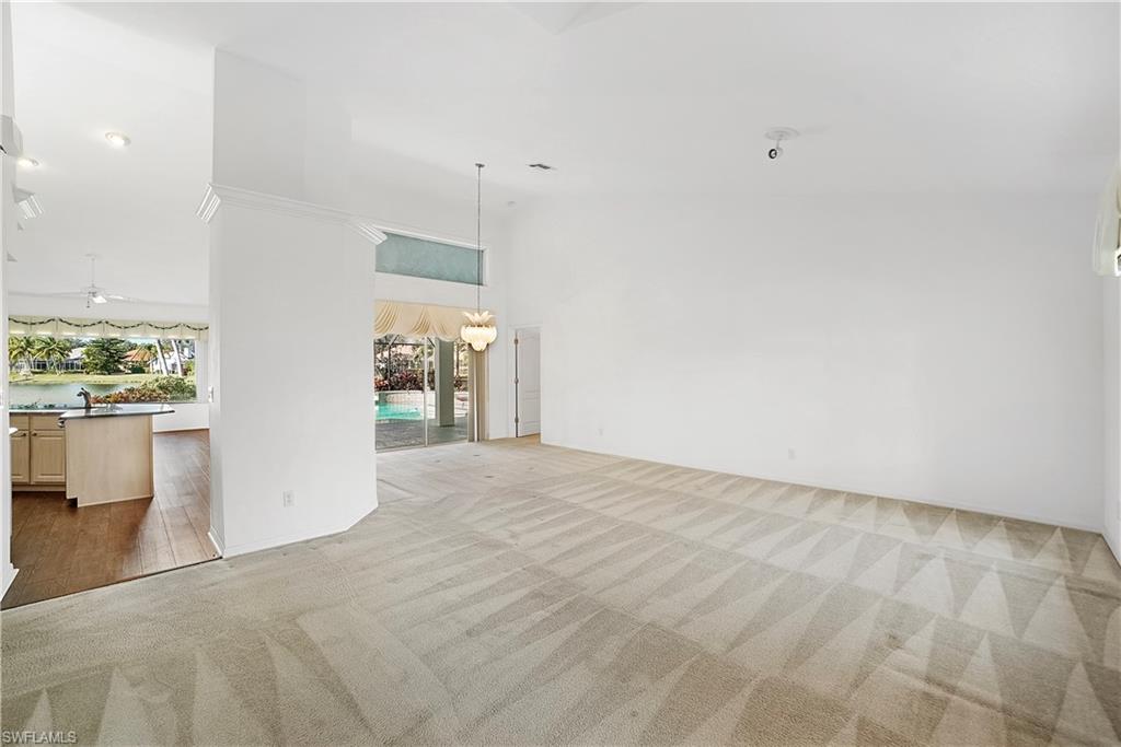 10969 Phoenix Way Naples, FL 34119 - Photo 10 of 20 a view of an empty room with a window