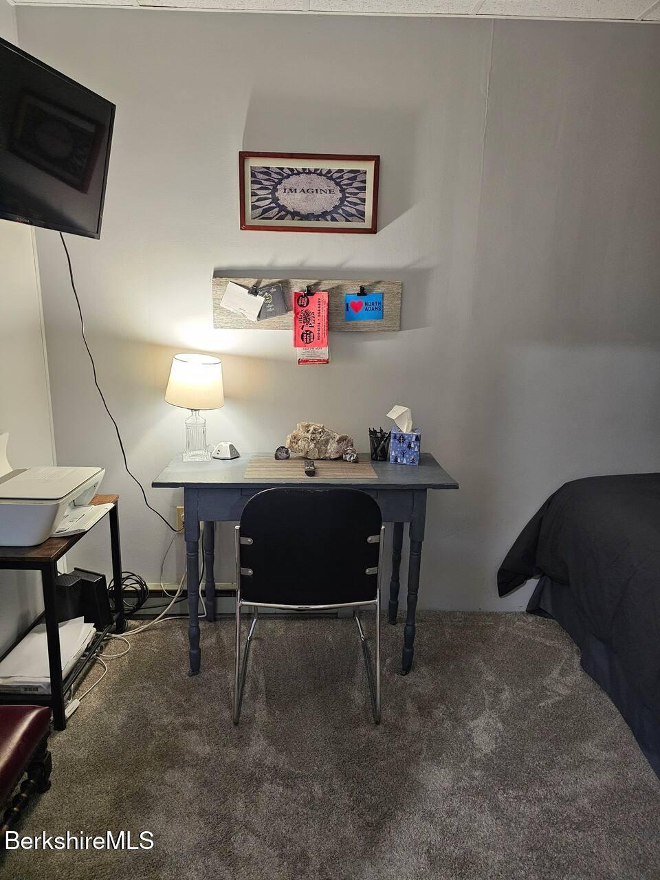 19 Church Street, Unit 10 North Adams, MA 01247 - Photo 14 of 15 a view of a room with furniture and a potted plant