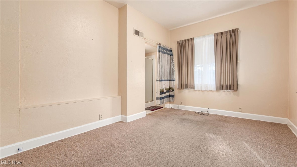 427 Harding Road Zanesville, OH 43701 - Photo 17 of 23 Spare room featuring baseboards and carpet floors