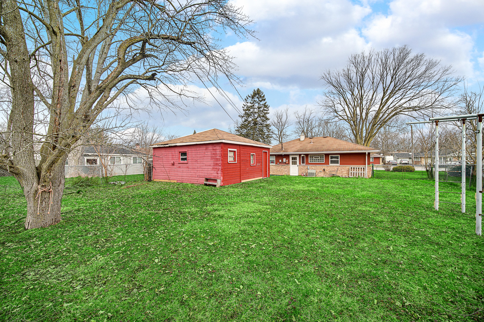 269 Blackhawk Drive Park Forest, IL 60466 - Photo 21 of 21 a view of a house with a yard