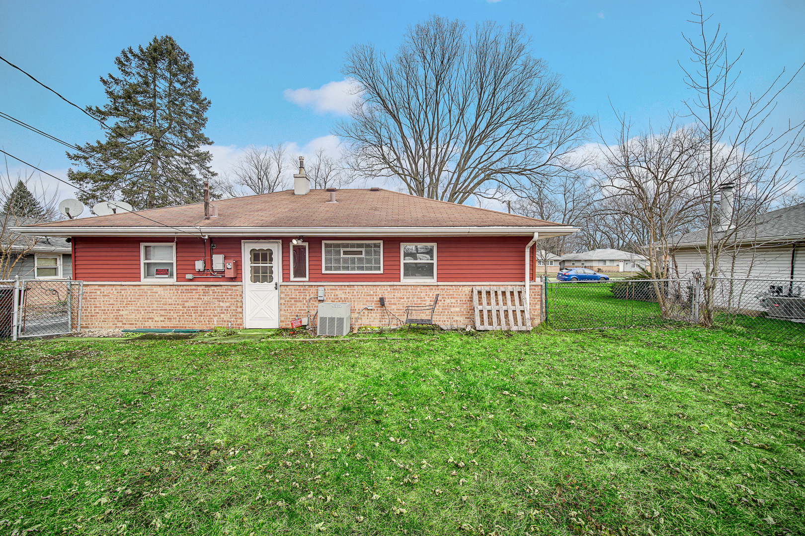 269 Blackhawk Drive Park Forest, IL 60466 - Photo 4 of 21 a front view of a house with a garden