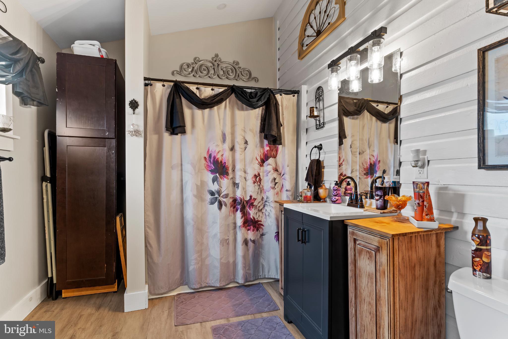 1060 Dry Tavern Road Denver, PA 17517 - Photo 13 of 30 a view of walk in closet with clothes and shoes